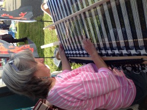 Margaret working on her rigid heddle loom