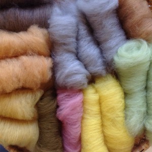 Re-carded the fibre to open it out more